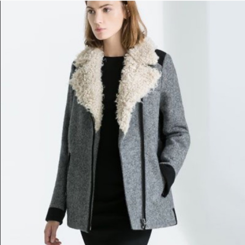 Grey Zara wool shearling jacket with black contrast and lining. Has a hole in t
